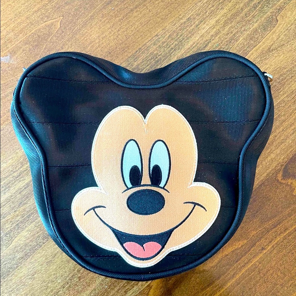 Like New Mickey Harvey’s bag.